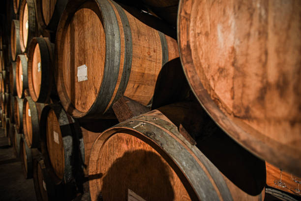 Mature whisky casks stored together for stock selection and assembly